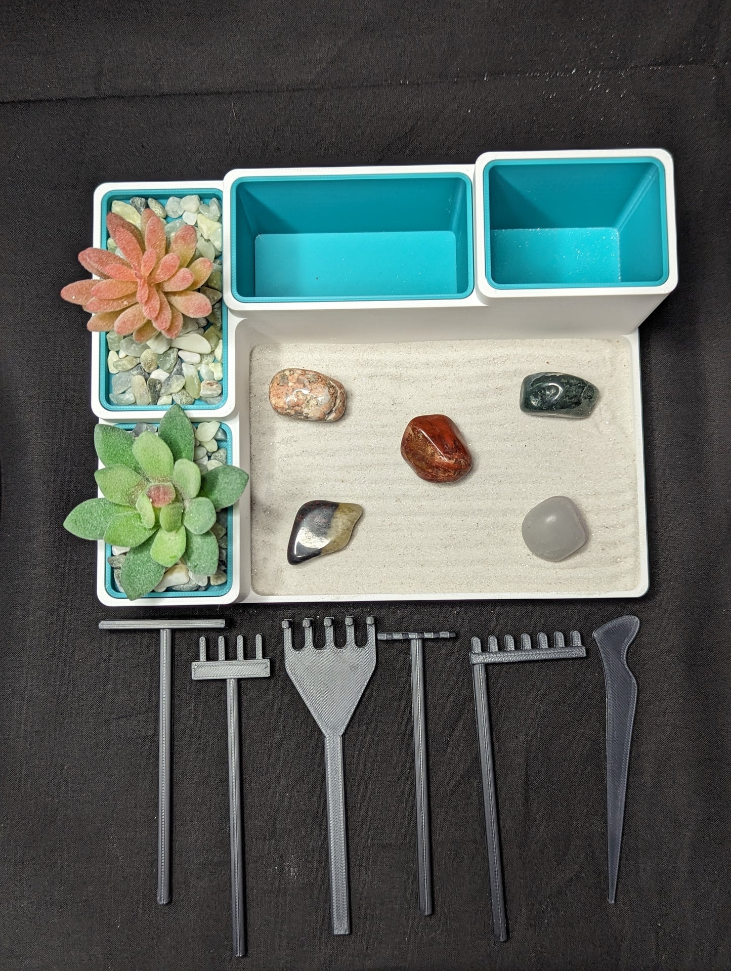 Zen Garden with Tools and Lush Plants